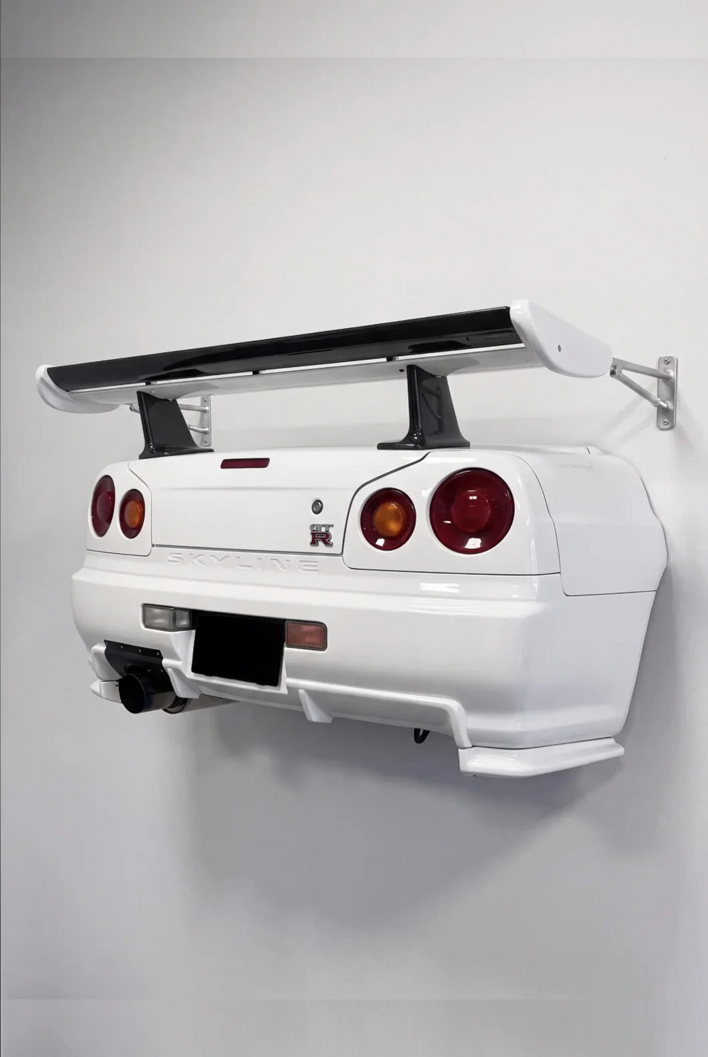 WingMount car shelf displaying die-cast model cars on its shelf