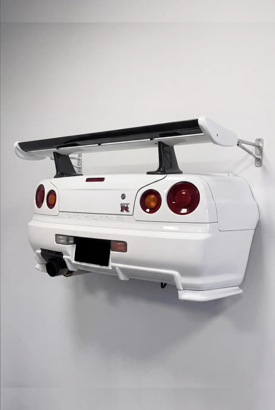 WingMount car shelf displaying die-cast model cars on its shelf